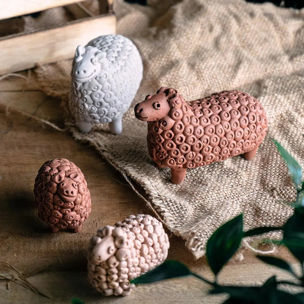 Terracotta Bull Sculpture and Sheep Family Sculpture